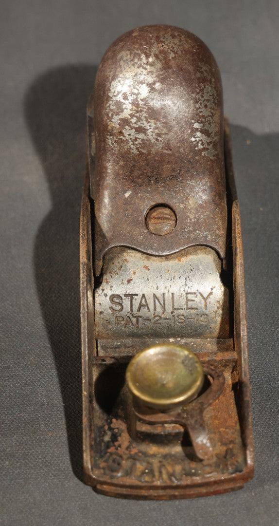 Trio of Vintage and Antique Stanley and Unbranded Metal Block Planes Including Stanley No. 220, Stanley Patent 2-18-13, and Made in U.S.A. Example