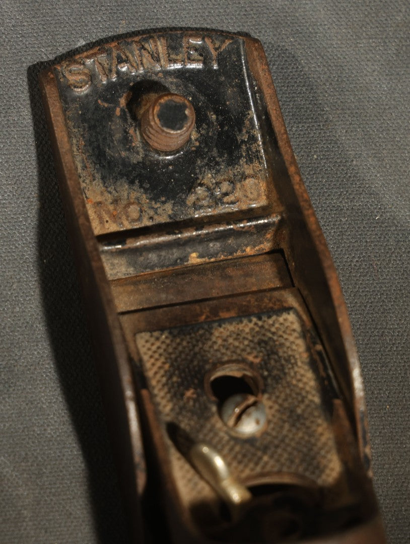 Trio of Vintage and Antique Stanley and Unbranded Metal Block Planes Including Stanley No. 220, Stanley Patent 2-18-13, and Made in U.S.A. Example