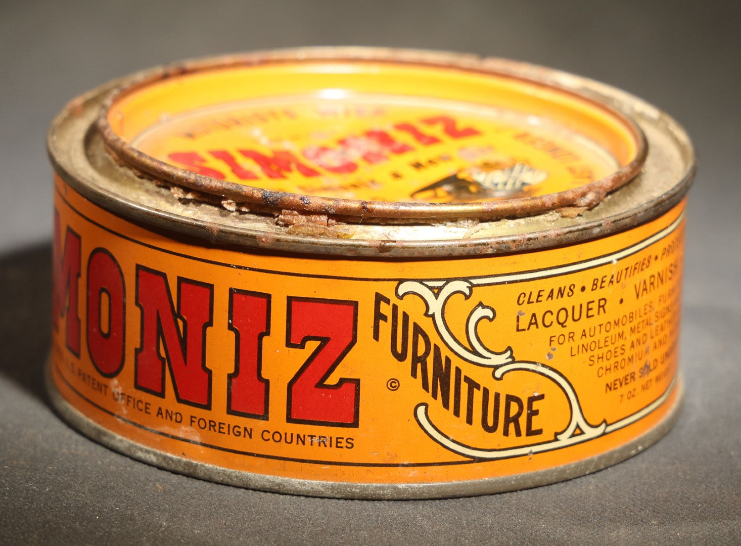 Vintage Simoniz Automobile and Furniture Wax Tin, 7 Oz., Lid with Period Automobile and Figure Graphic, the Simoniz Company, Chicago, Illinois
