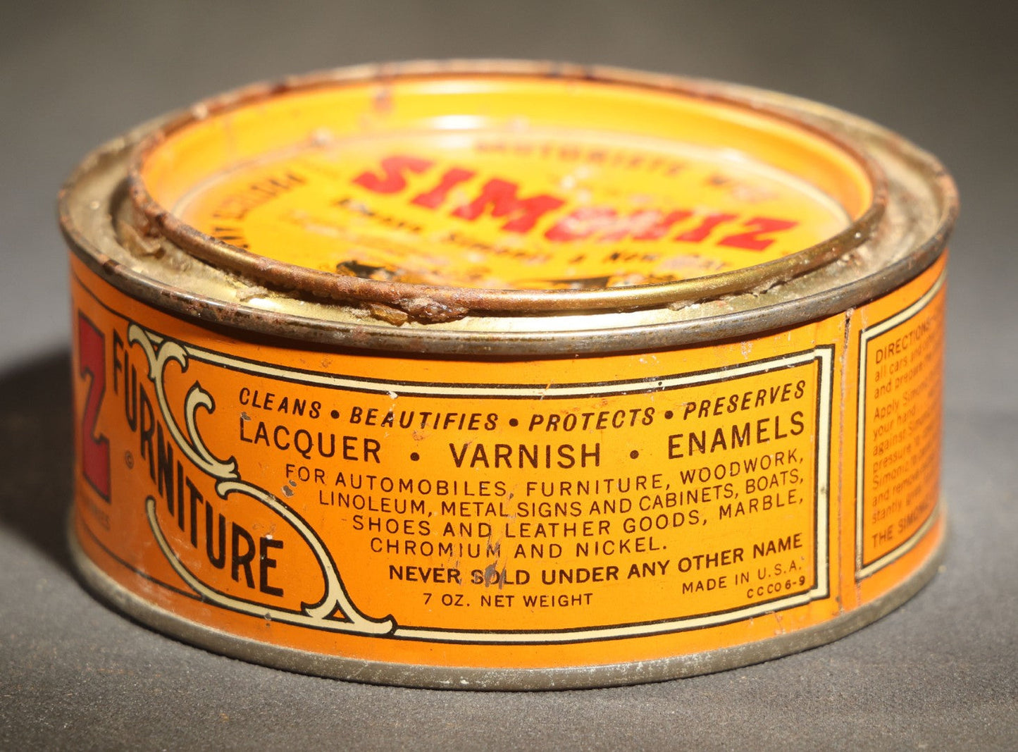 Vintage Simoniz Automobile and Furniture Wax Tin, 7 Oz., Lid with Period Automobile and Figure Graphic, the Simoniz Company, Chicago, Illinois