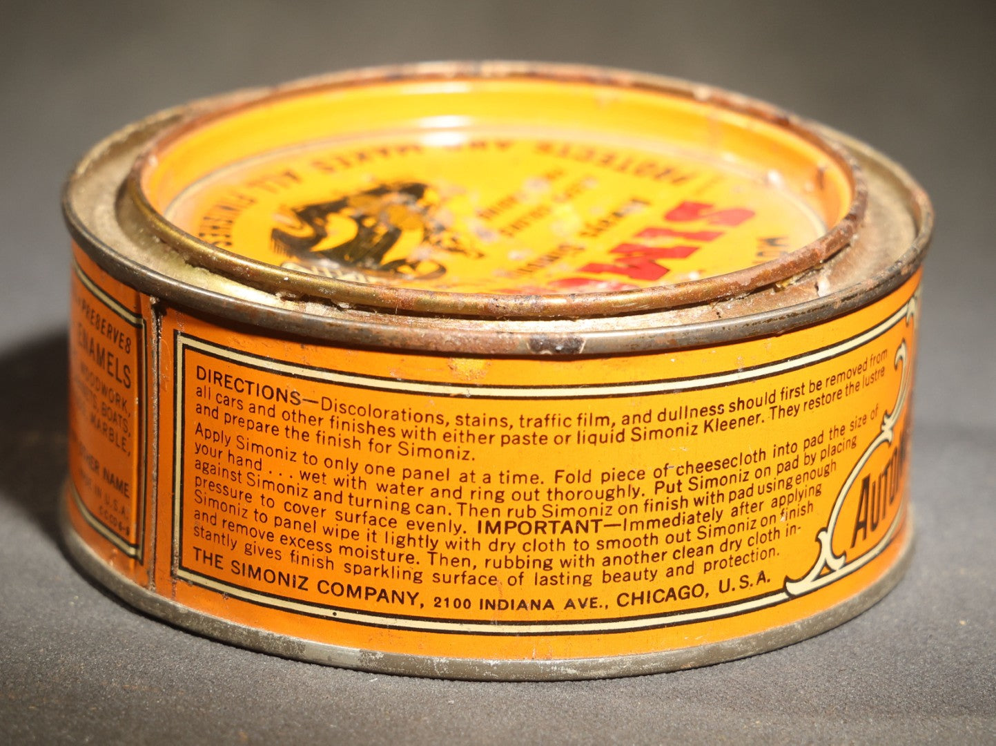 Vintage Simoniz Automobile and Furniture Wax Tin, 7 Oz., Lid with Period Automobile and Figure Graphic, the Simoniz Company, Chicago, Illinois