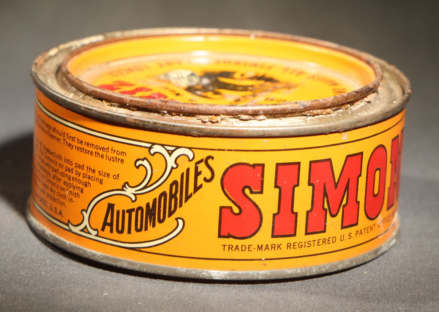 Vintage Simoniz Automobile and Furniture Wax Tin, 7 Oz., Lid with Period Automobile and Figure Graphic, the Simoniz Company, Chicago, Illinois