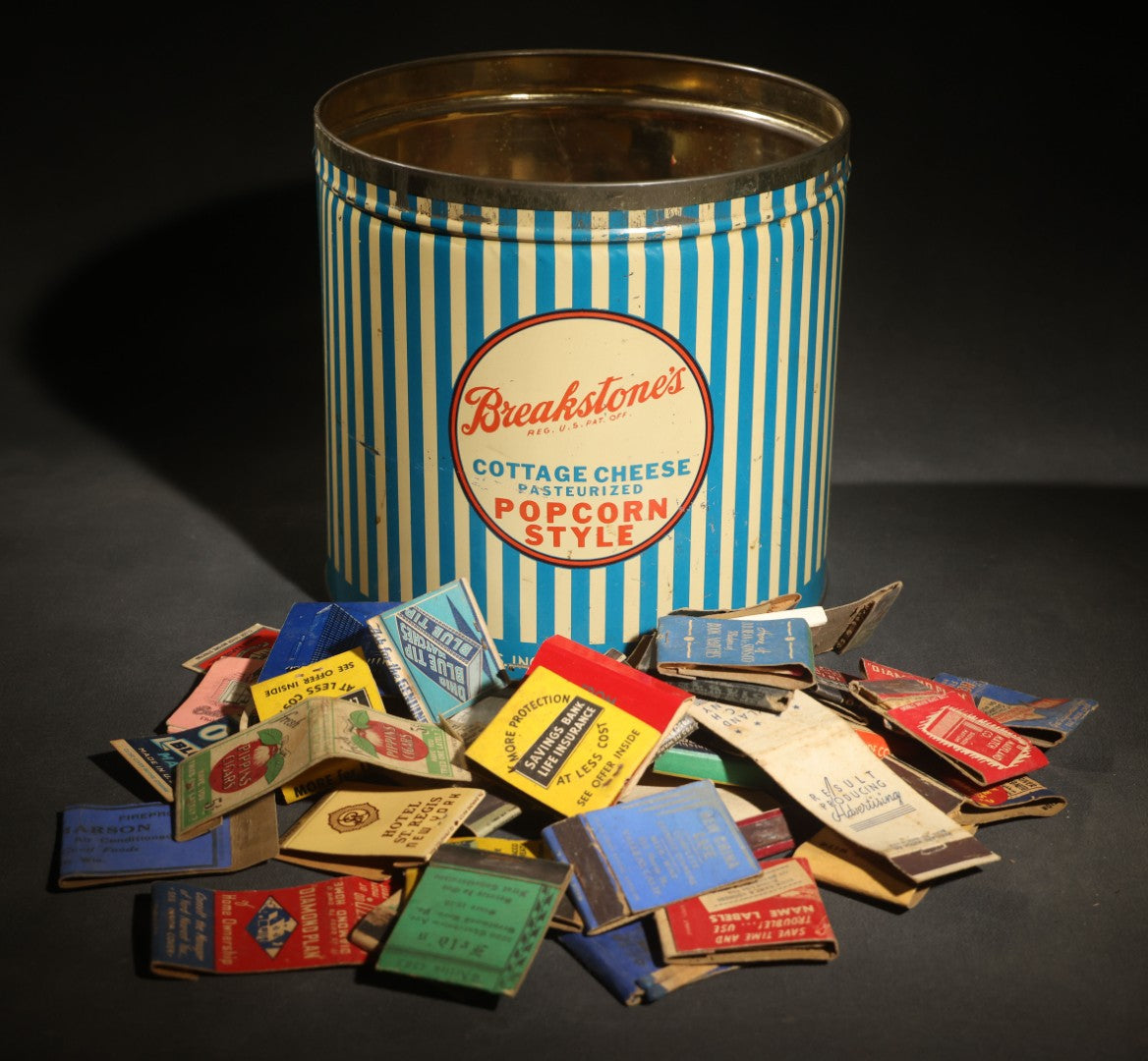 Vintage Breakstone Bros. Cottage Cheese Advertising Tin with Discovery Collection of Vintage Advertising Matchbooks Including Hotel St. Regis New York, Pippins Cigars, New China Cafe Vallejo California, and Others