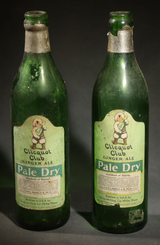Pair of Vintage Clicquot Club Ginger Ale Pale Dry Bottles with Arctic Figure Mascot Label Graphic, Clicquot Club Co., Millis, Massachusetts