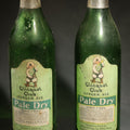 Lot 060 - Pair of Vintage Clicquot Club Ginger Ale Pale Dry Bottles with Arctic Figure Mascot Label Graphic, Clicquot Club Co., Millis, Massachusetts, 10" H each