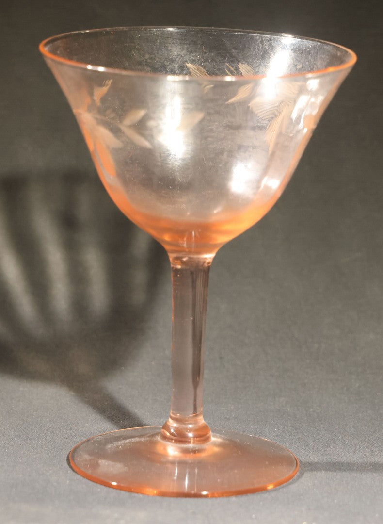 Trio of Vintage Pink Depression Glass Including Floral Relief Creamer, Cubist Open Sugar, and Etched Champagne Coupe