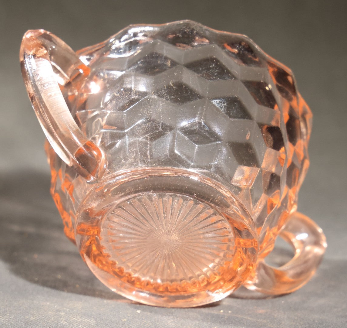 Trio of Vintage Pink Depression Glass Including Floral Relief Creamer, Cubist Open Sugar, and Etched Champagne Coupe