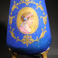 Lot 073 - Antique Porcelain Footed Vase, Cobalt Blue Ground with Gilt Scrollwork and Hand-Painted Portrait Medallion, Note Repaired Circumferential Crack at Base, 7-1/4" H