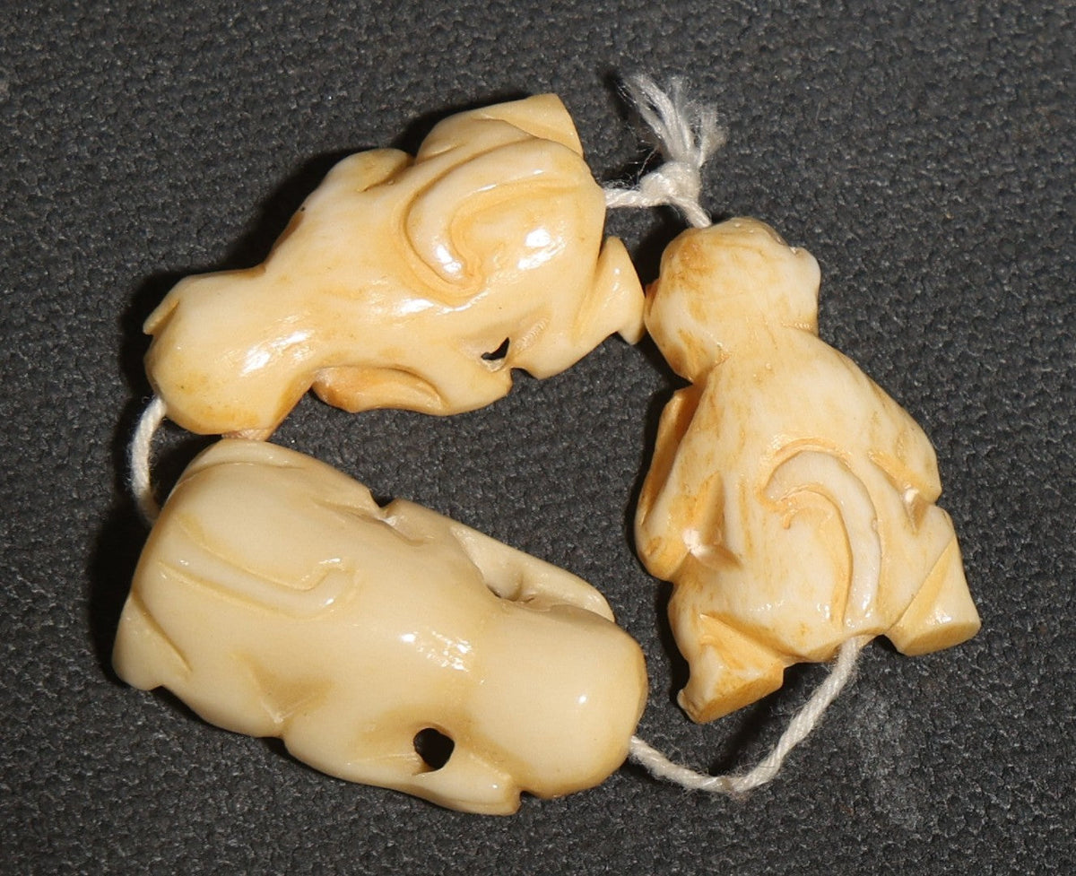 Trio of Carved Bone Netsuke-Style "Sanzaru" Three Wise Monkeys Pendants, Mizaru (See no Evil), Kikazaru (Hear no Evil), and Iwazaru (Speak no Evil), Strung on Cord