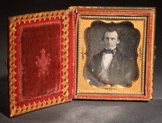 Antique 1/6th Plate Daguerreotype Photograph of a Middle-Aged Man, Photographed by Smith, Rochester, New York, in Papier-MâChé Case with Mother-Of-Pearl Inlay and Rose Decoration