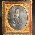 Lot 092 - Antique 1/6th Plate Daguerreotype Photograph of a Young Woman with Brooch, Photographed by Chase, 175 Washington Street, in Half Leatherette Union Case