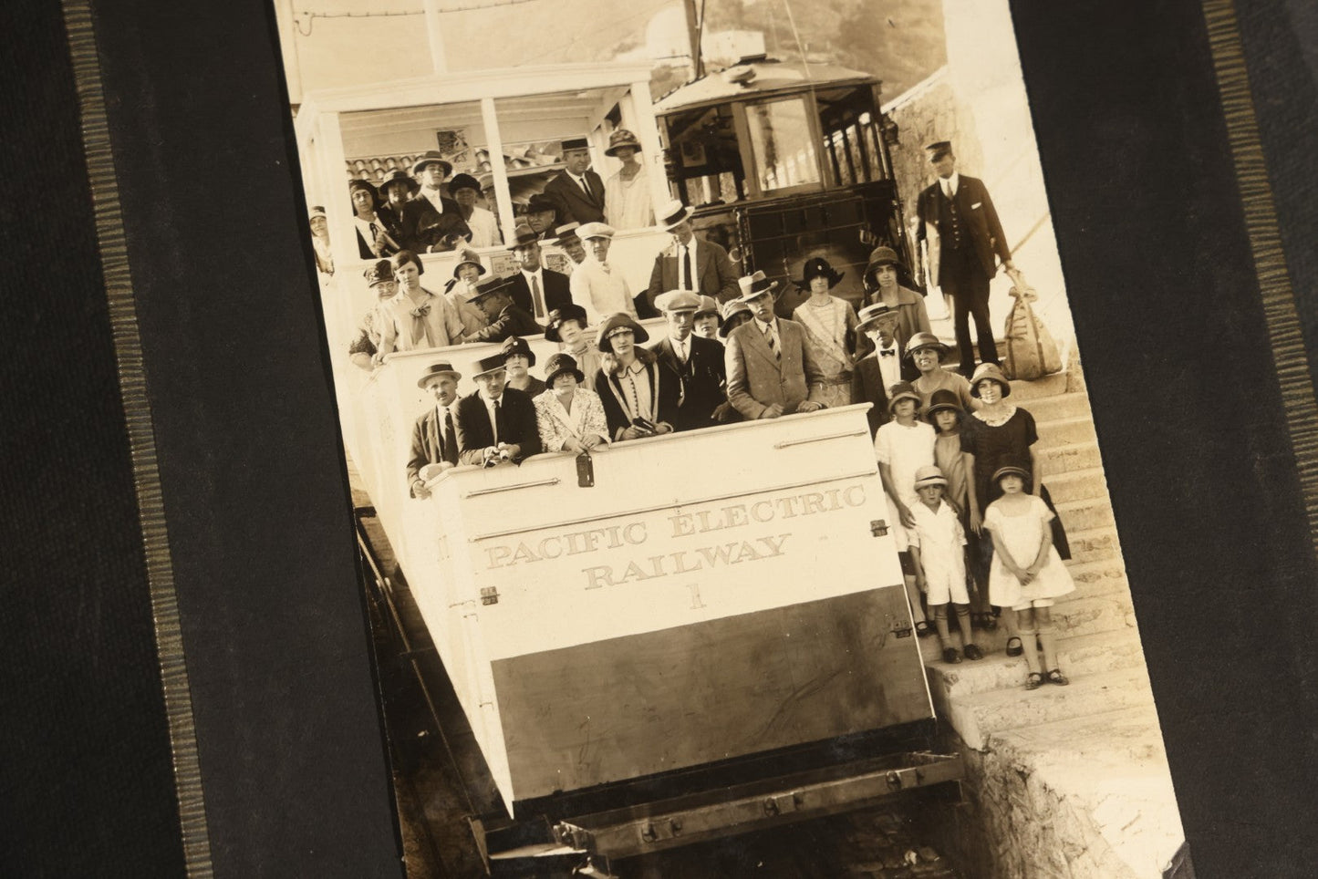 Antique Snapshot Album, Circa WWI Era, 200+ Photographs Including Police Officer on Indian Motorcycle, Pacific Electric Railway, Railroad and Trolley Workers, Woman in Navy Sailor Outfit with Gas Mask, and Beach Scenes
