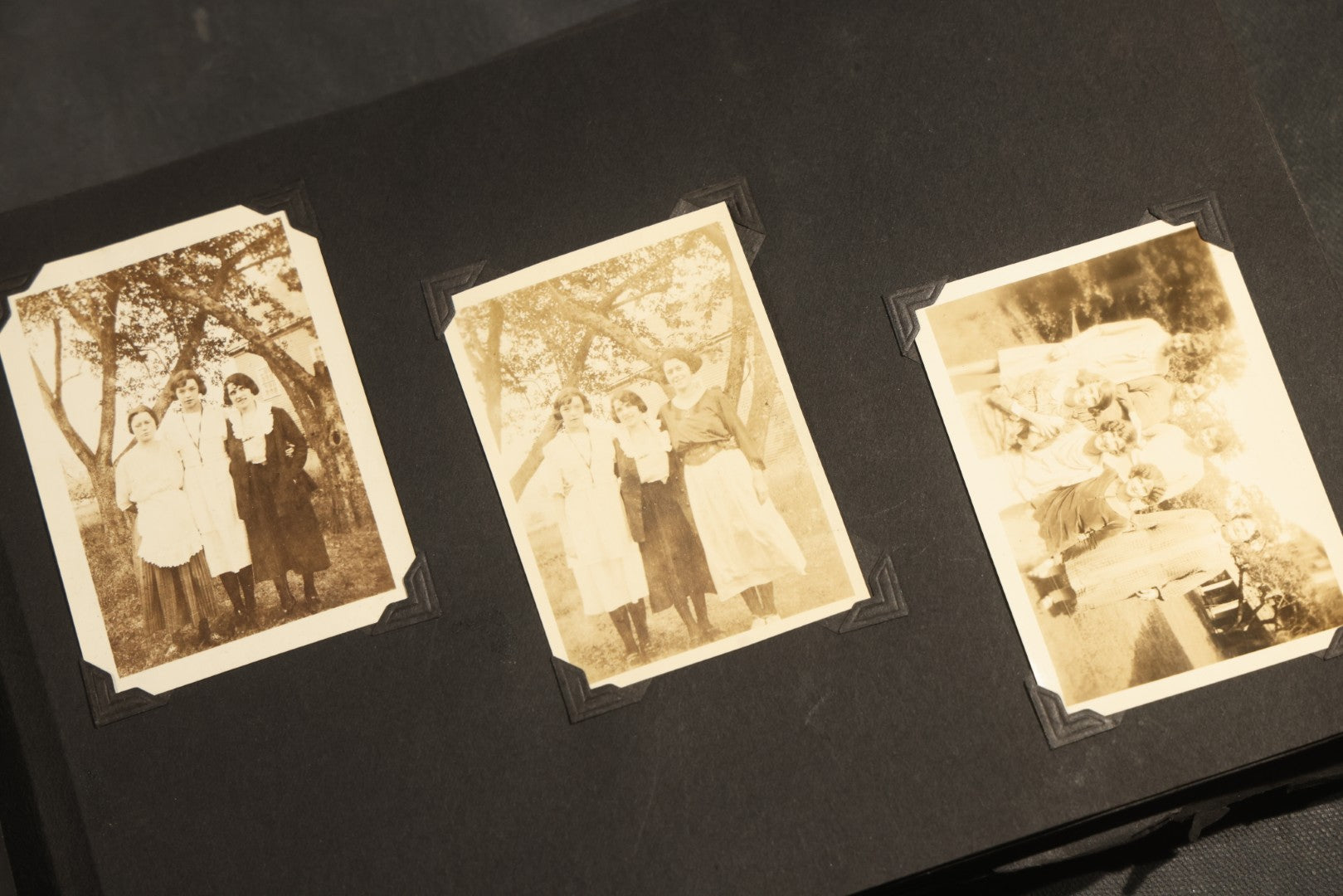 Antique Snapshot Album, Circa WWI Era, 200+ Photographs Including Police Officer on Indian Motorcycle, Pacific Electric Railway, Railroad and Trolley Workers, Woman in Navy Sailor Outfit with Gas Mask, and Beach Scenes