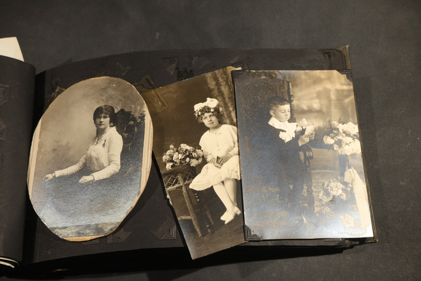 Antique Snapshot Album, Circa WWI Era, 200+ Photographs Including Police Officer on Indian Motorcycle, Pacific Electric Railway, Railroad and Trolley Workers, Woman in Navy Sailor Outfit with Gas Mask, and Beach Scenes