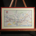 Lot 141 - Modern Framed Metro De Barcelona Transit Map, Barcelona, Spain, in Red Metal Frame, 14-1/4" W x 9-3/8" H