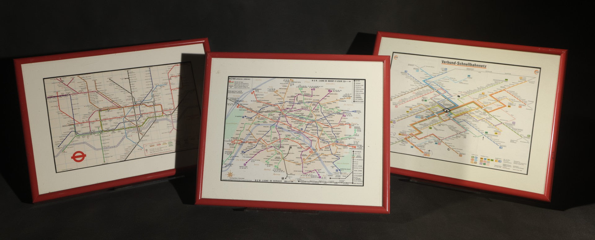Trio of Modern Framed Transit Maps Including London Underground, Paris MéTro with R.E.R. Lines, and Stuttgart Verbund-Schnellbahnnetz, in Red Metal Frames