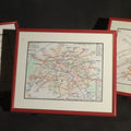 Lot 142 - Trio of Modern Framed Transit Maps Including London Underground, Paris MéTro with R.E.R. Lines, and Stuttgart Verbund-Schnellbahnnetz, in Red Metal Frames