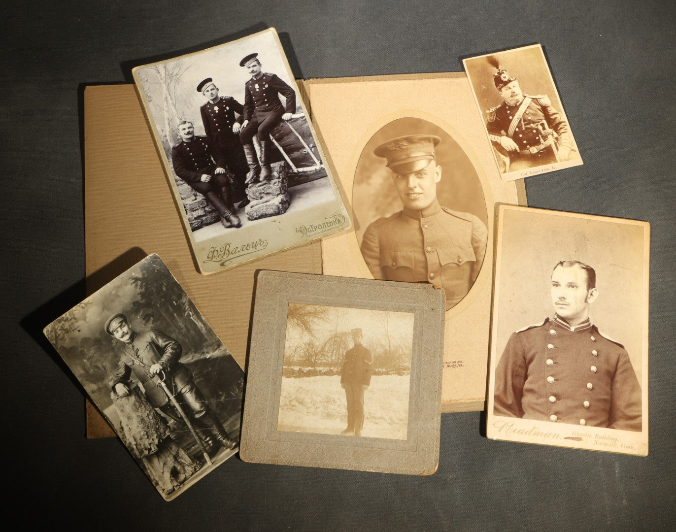 Grouping of Six Antique Military Portrait Photographs Including C.D.V. of Col. James Fisk Jr. in Uniform, Russian Imperial Soldiers by F. Waltz Ostroleka, and U.S. WWI Portrait by Holladay, Newport News Virginia