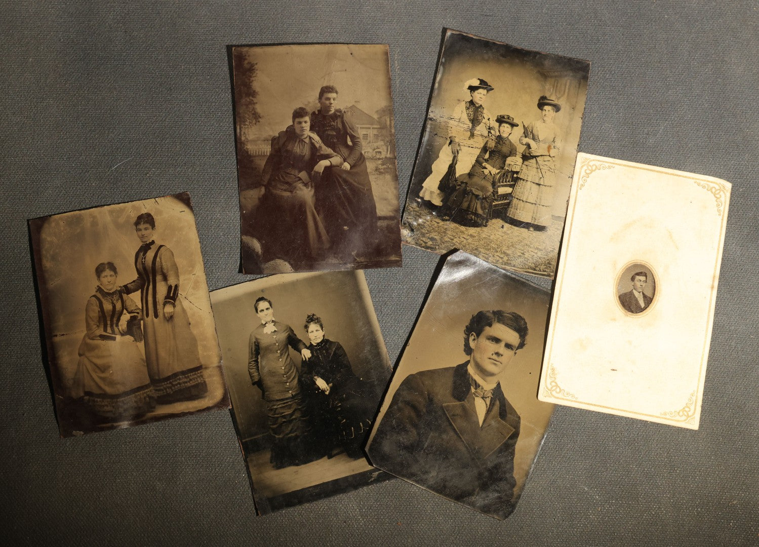 Grouping of Six Antique Tintype Photographs, Portrait of Women, Pairs, and a Young Man, Including One Gem Tintype in Paper Frame