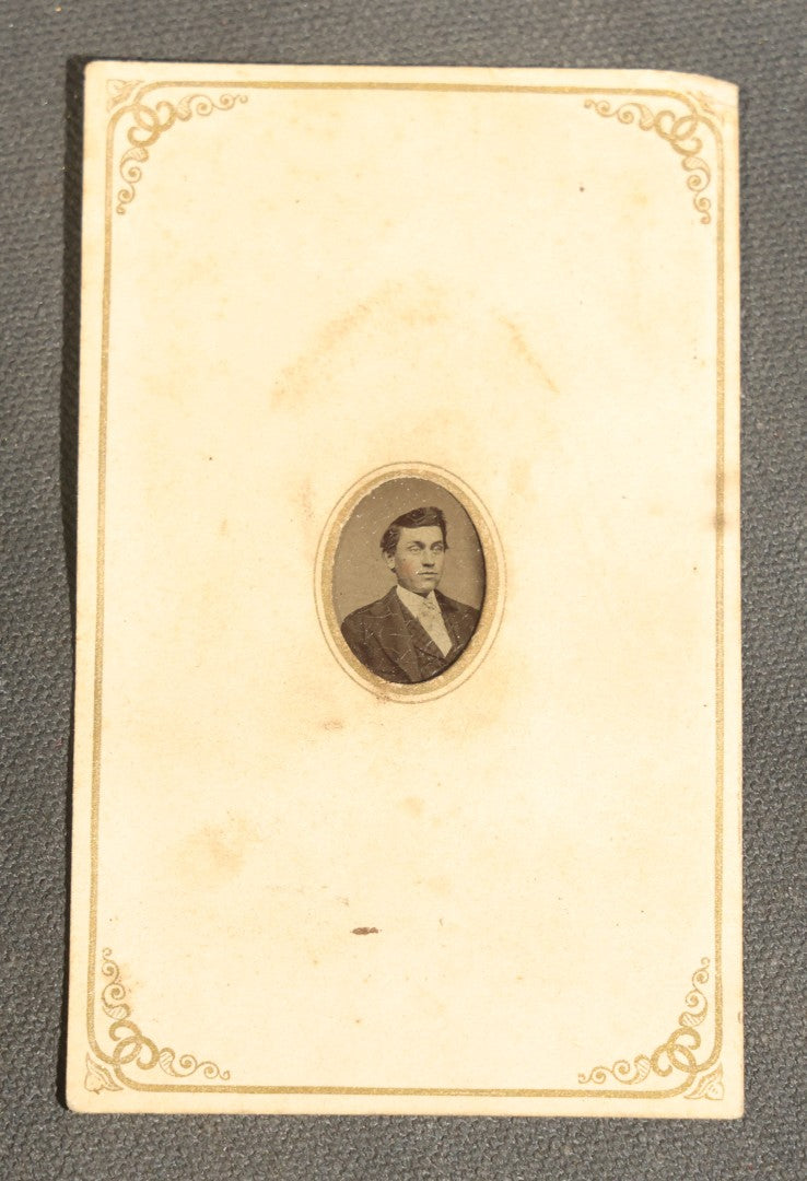 Grouping of Six Antique Tintype Photographs, Portrait of Women, Pairs, and a Young Man, Including One Gem Tintype in Paper Frame