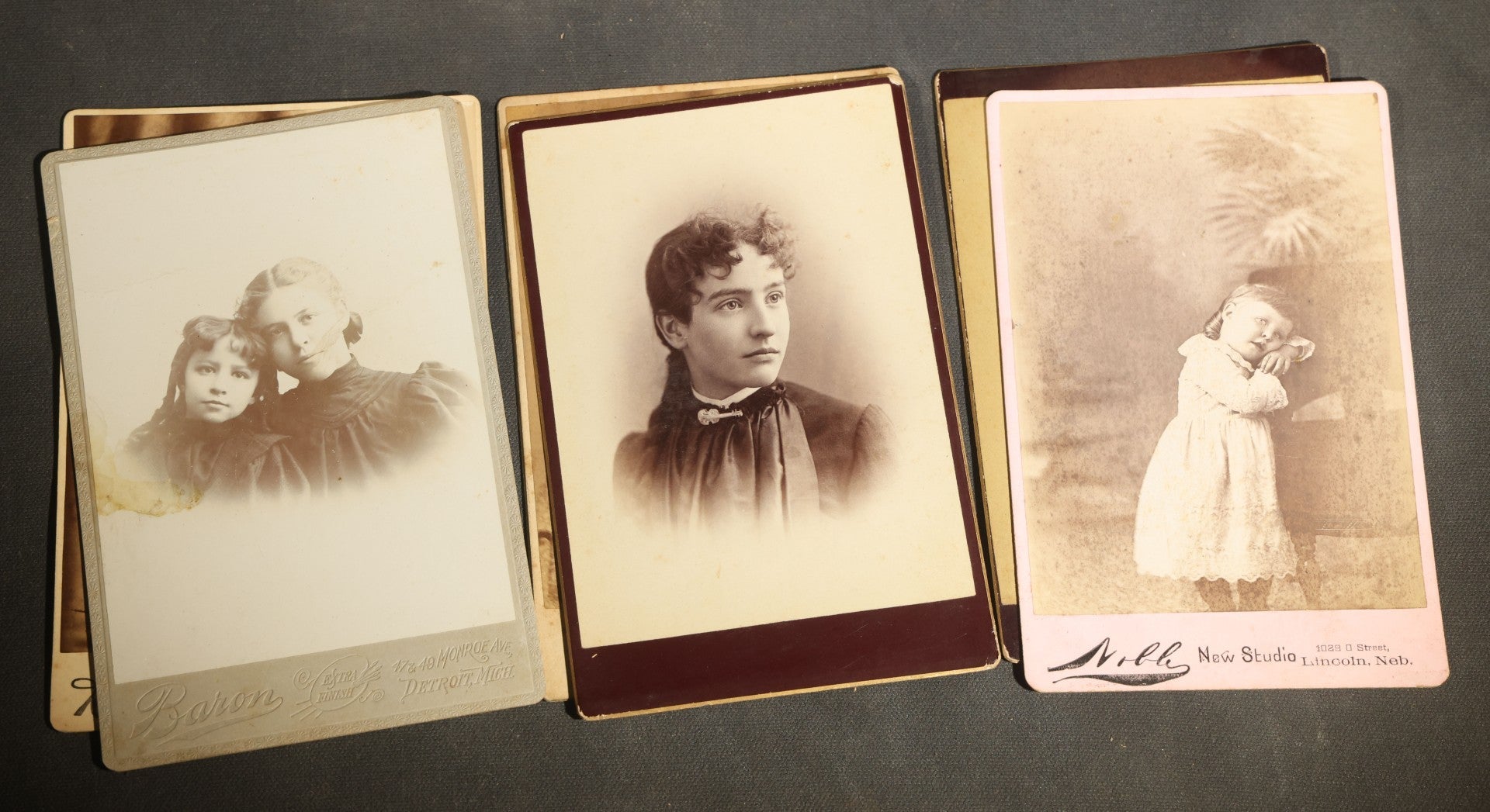 Grouping of 29 Antique Cabinet Card Photographs, Portrait Studies of Men, Women, and Children, Including Examples by Randall and Smith of Detroit, and Other Michigan Studios