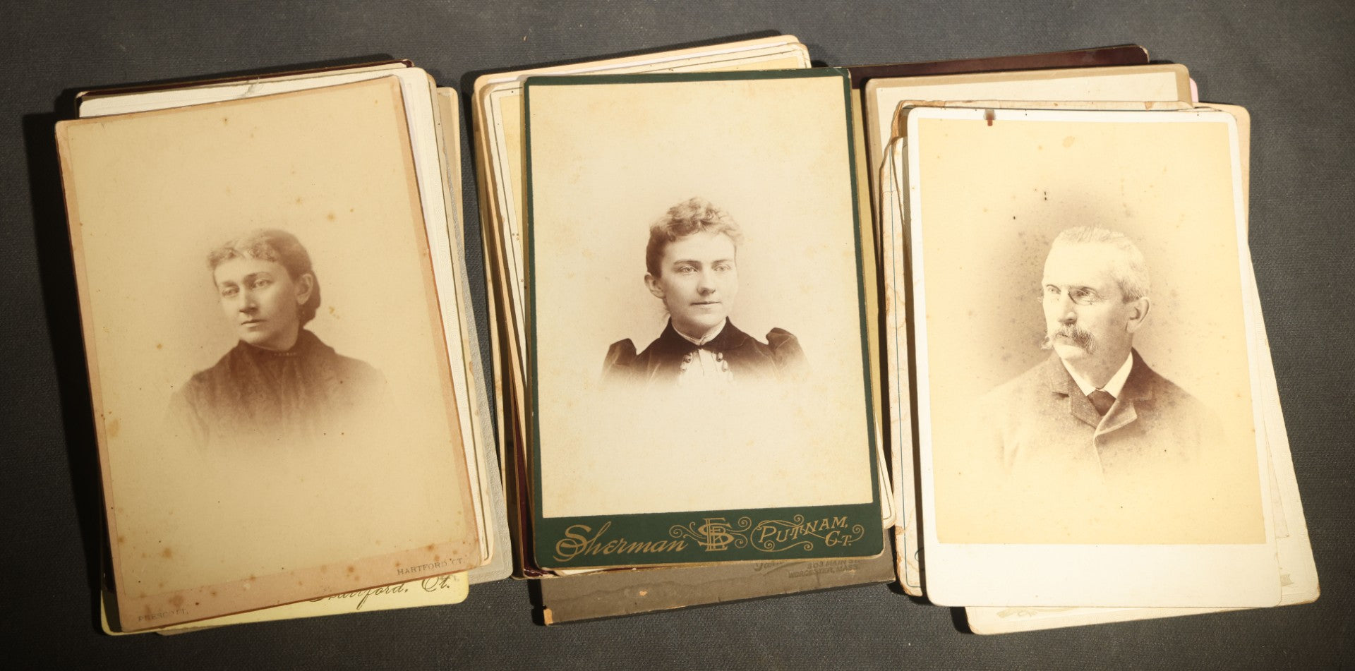 Grouping of 29 Antique Cabinet Card Photographs, Portrait Studies of Men, Women, and Children, Including Examples by Randall and Smith of Detroit, and Other Michigan Studios