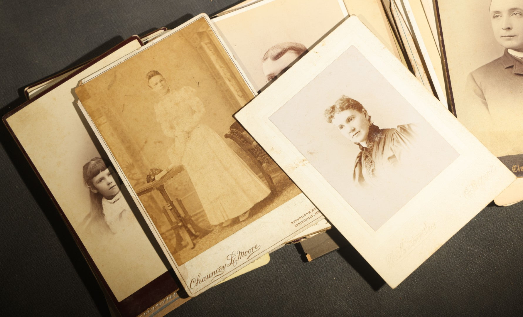 Grouping of 29 Antique Cabinet Card Photographs, Portrait Studies of Men, Women, and Children, Including Examples by Randall and Smith of Detroit, and Other Michigan Studios