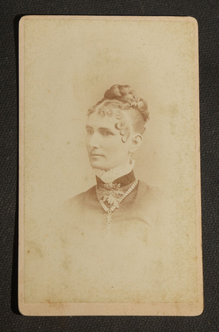 Grouping of 10 Antique Carte De Visite C.D.V. Photographs, Portrait Studies of Men, Women, and Children, Including Two Illustrated Filler Cards