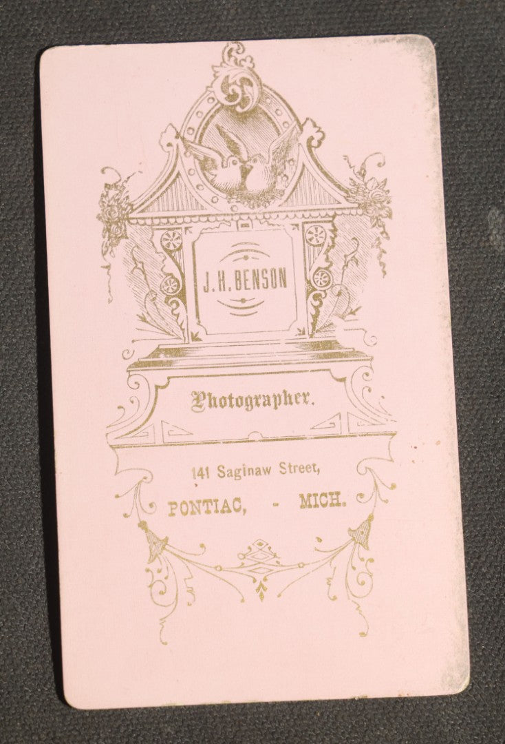 Grouping of 10 Antique Carte De Visite C.D.V. Photographs, Portrait Studies of Men, Women, and Children, Including Two Illustrated Filler Cards