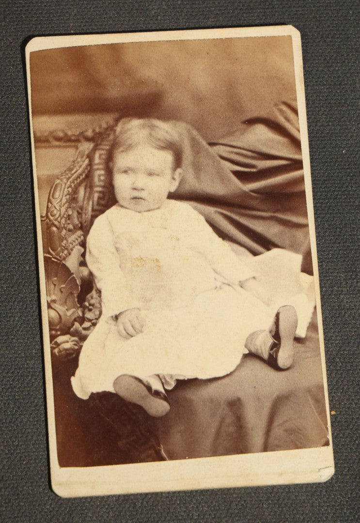 Grouping of 10 Antique Carte De Visite C.D.V. Photographs, Portrait Studies of Men, Women, and Children, Including Two Illustrated Filler Cards