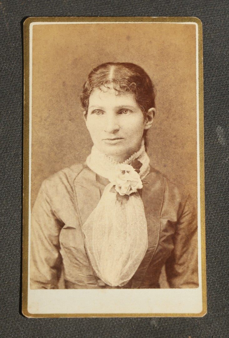Grouping of 10 Antique Carte De Visite C.D.V. Photographs, Portrait Studies of Men, Women, and Children, Including Two Illustrated Filler Cards