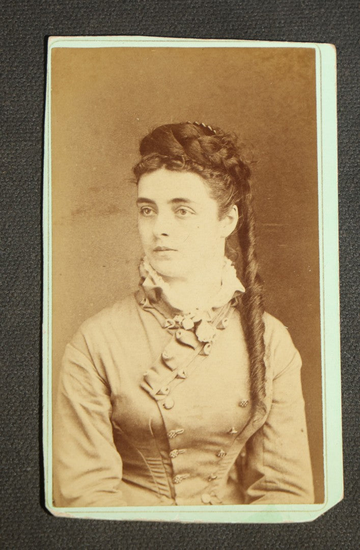 Grouping of 10 Antique Carte De Visite C.D.V. Photographs, Portrait Studies of Men, Women, and Children, Including Two Illustrated Filler Cards