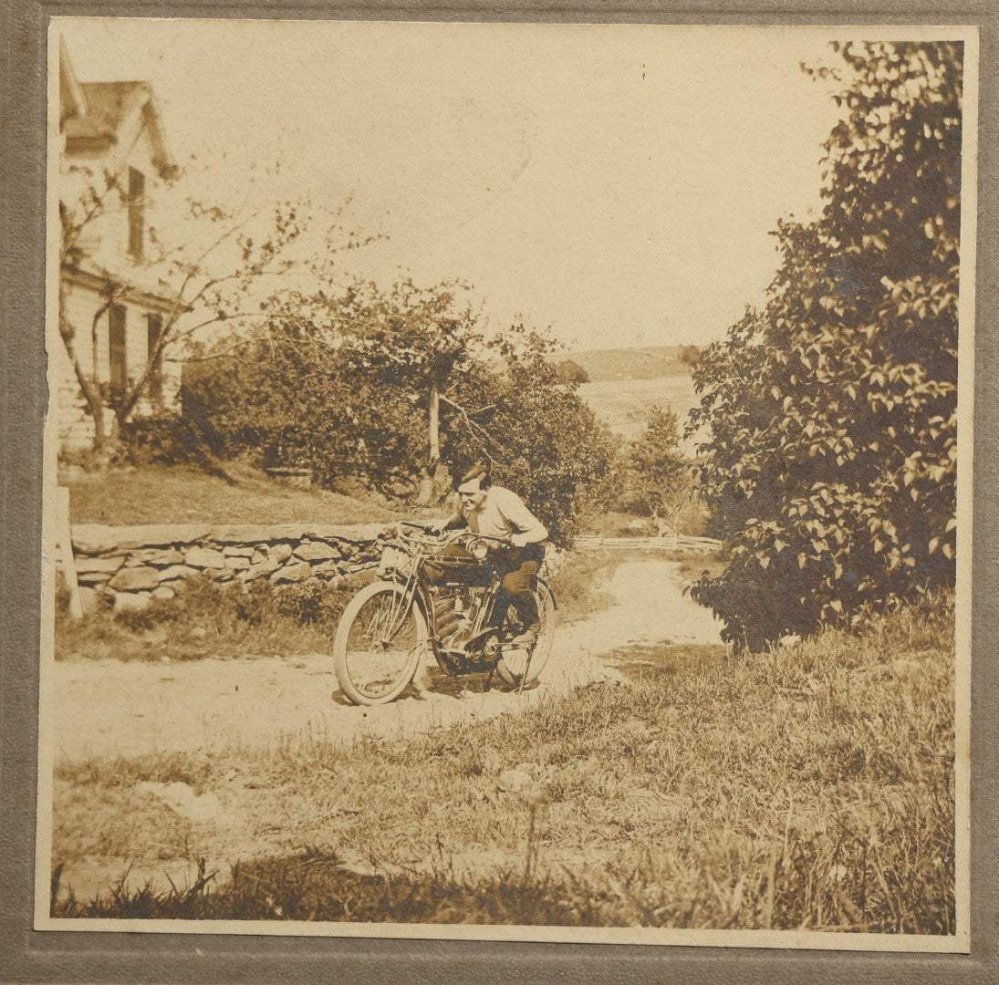 Antique Board-Mounted Photograph of a Young Man Astride an Early Indian Motorcycle on a Rural Road
