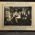Lot 099 - Vintage Sloppy Joe's Bar Havana Cuba Souvenir Photograph, Group of German Naval Sailors from S.M.S. Karlsruhe in Port, with Maracas at the Bar, 9-1/8" W x 7" H