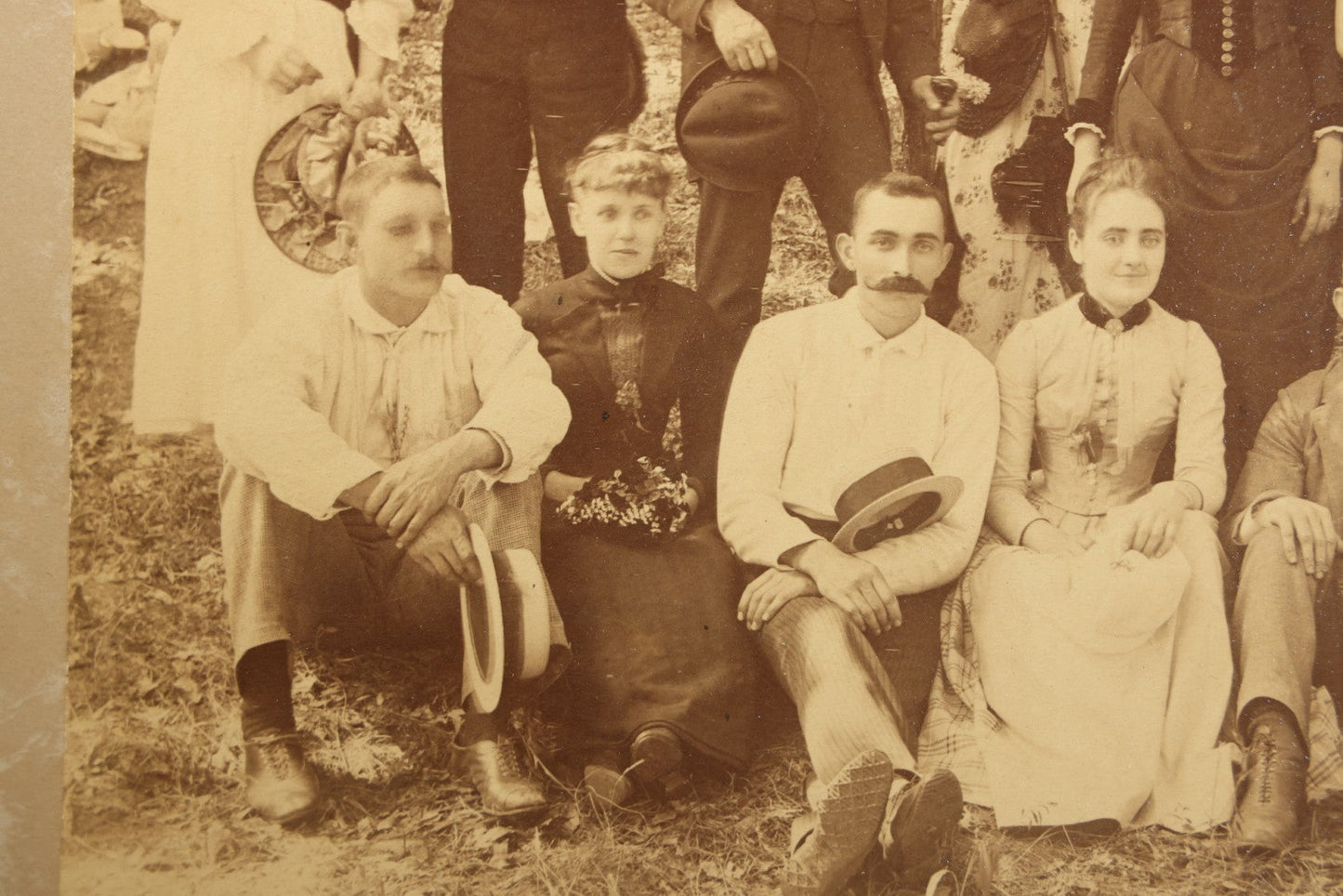 Antique Board-Mounted Photograph of a Large Group Gathered Outdoors in a Wooded Setting, Men and Women in Victorian Dress