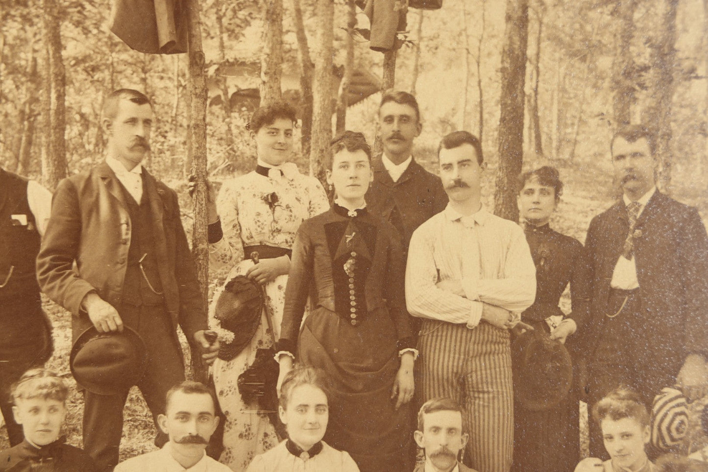 Antique Board-Mounted Photograph of a Large Group Gathered Outdoors in a Wooded Setting, Men and Women in Victorian Dress