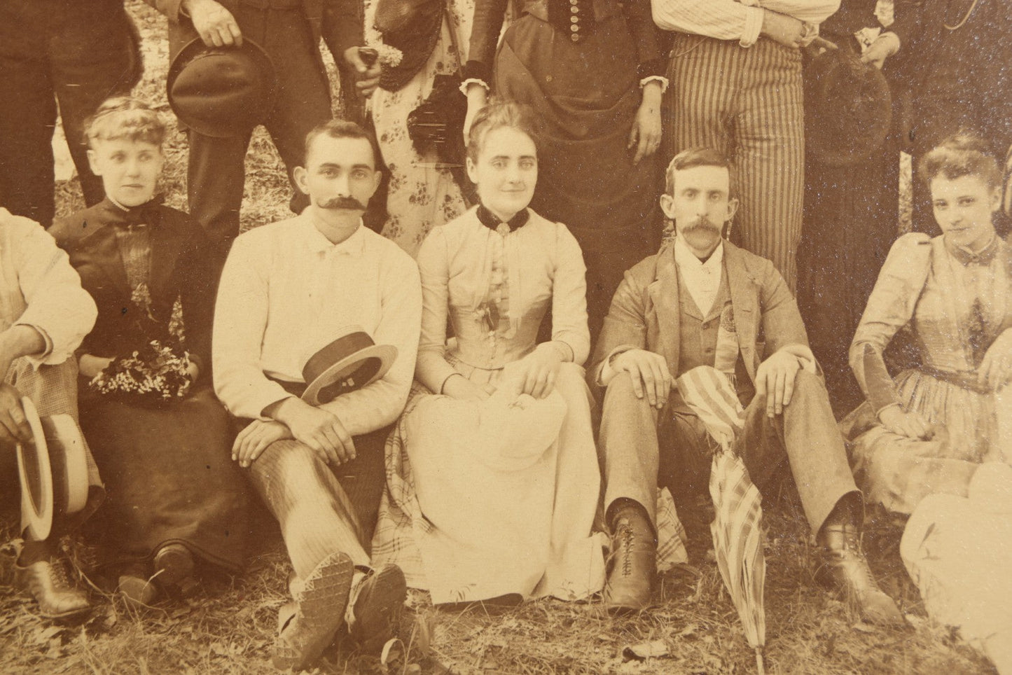 Antique Board-Mounted Photograph of a Large Group Gathered Outdoors in a Wooded Setting, Men and Women in Victorian Dress