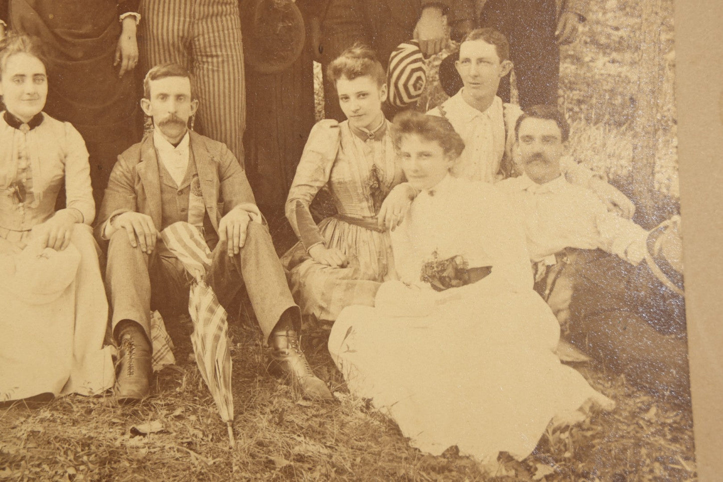 Antique Board-Mounted Photograph of a Large Group Gathered Outdoors in a Wooded Setting, Men and Women in Victorian Dress