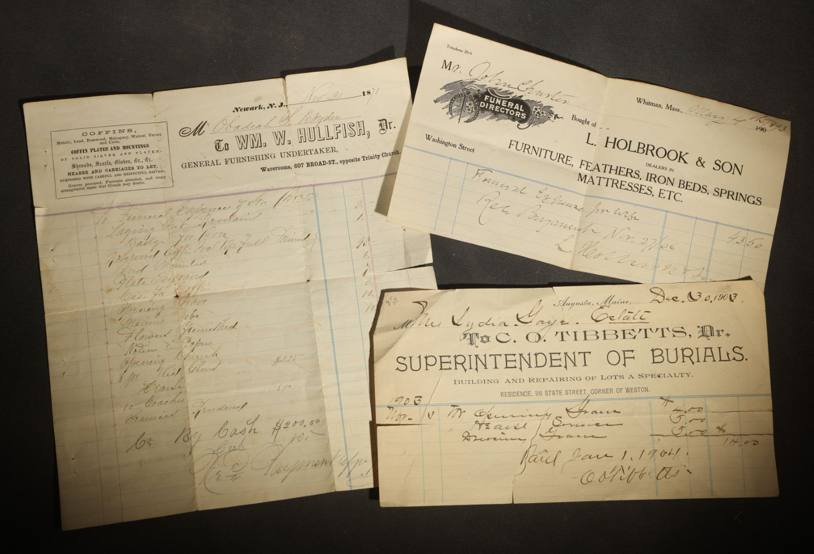 Trio of Antique Funeral and Burial Trade Receipts Including Wm. W. Hullfish General Furnishing Undertaker Newark, New Jersey, C. O. Tibbetts Superintendent of Burials Augusta, Maine, and L. Holbrook & Son Funeral Directors Whitman, Massachusetts
