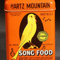 Lot 052 - Vintage Hartz Mountain Song Food Canary Bird Feed Advertising Tin, Orange Ground with Yellow Canary Graphic, New York, 3-1/2" H