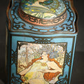 Lot 053 - Antique Art Nouveau Lithographed Tea Tin with Four Seasons Figural Panels After Alphonse Mucha, Blue Ground with Domed Lid, Note Heavy Rust to Base, 5-3/4" H