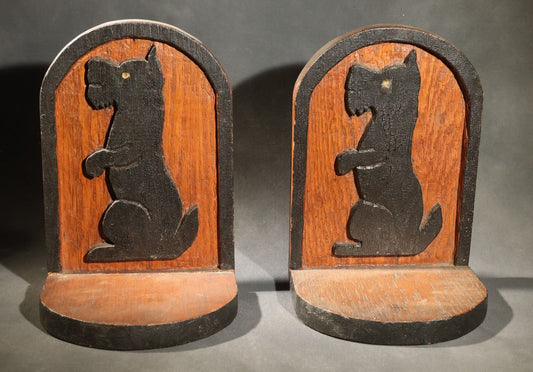 Pair of Antique Folk Art Carved and Painted Wood Bookends with Seated Scottie Dog Silhouette Figures
