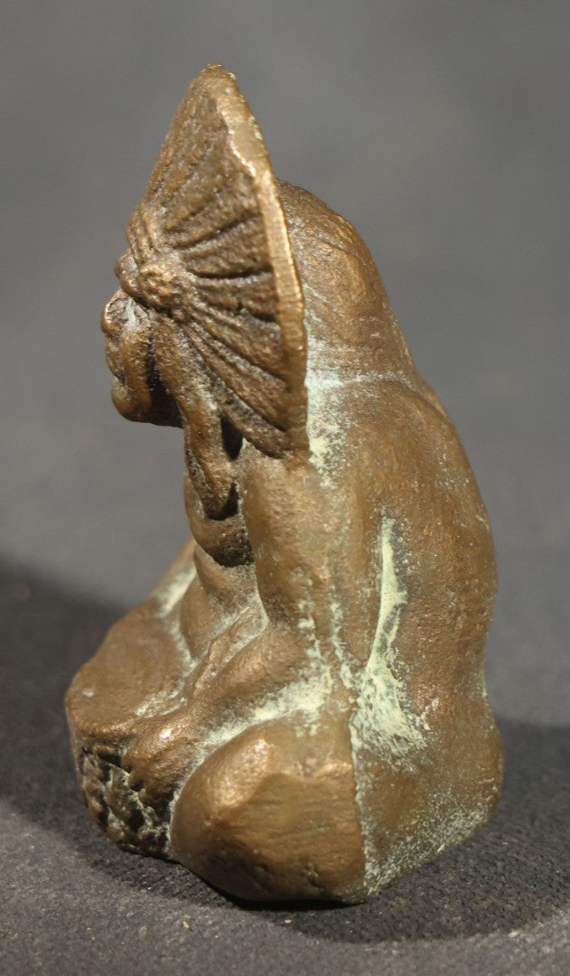 Vintage Brass Miniature Figural Paperweight of a Seated Figure in a Feathered Headdress Holding a Bowl