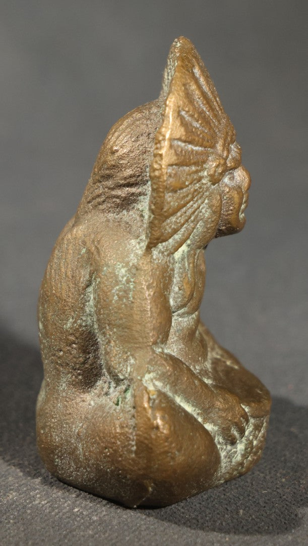 Vintage Brass Miniature Figural Paperweight of a Seated Figure in a Feathered Headdress Holding a Bowl