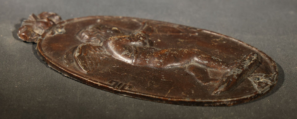 Antique Cast Iron Oval Wall Plaque of Cupid with Bow and Arrow, Shell and Crown Crest, Note Loss to Top of Bow