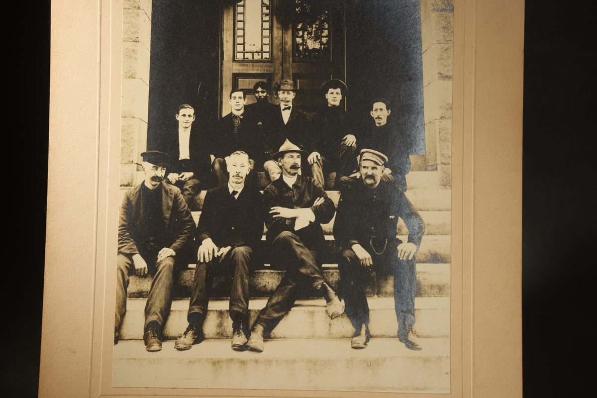 Trio of Antique Board-Mounted Photographs of Group Portraits, Including Seven Men Photographed by Geo. E. Mitchell's Gallery of Art, Lowell, Massachusetts, a Large Military or Militia Group with Rifles, and Ten Men on Building Steps