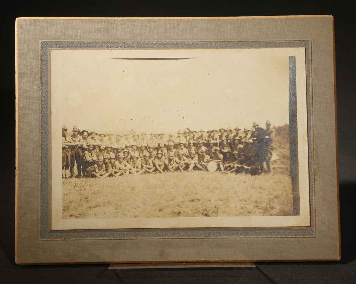 Trio of Antique Board-Mounted Photographs of Group Portraits, Including Seven Men Photographed by Geo. E. Mitchell's Gallery of Art, Lowell, Massachusetts, a Large Military or Militia Group with Rifles, and Ten Men on Building Steps