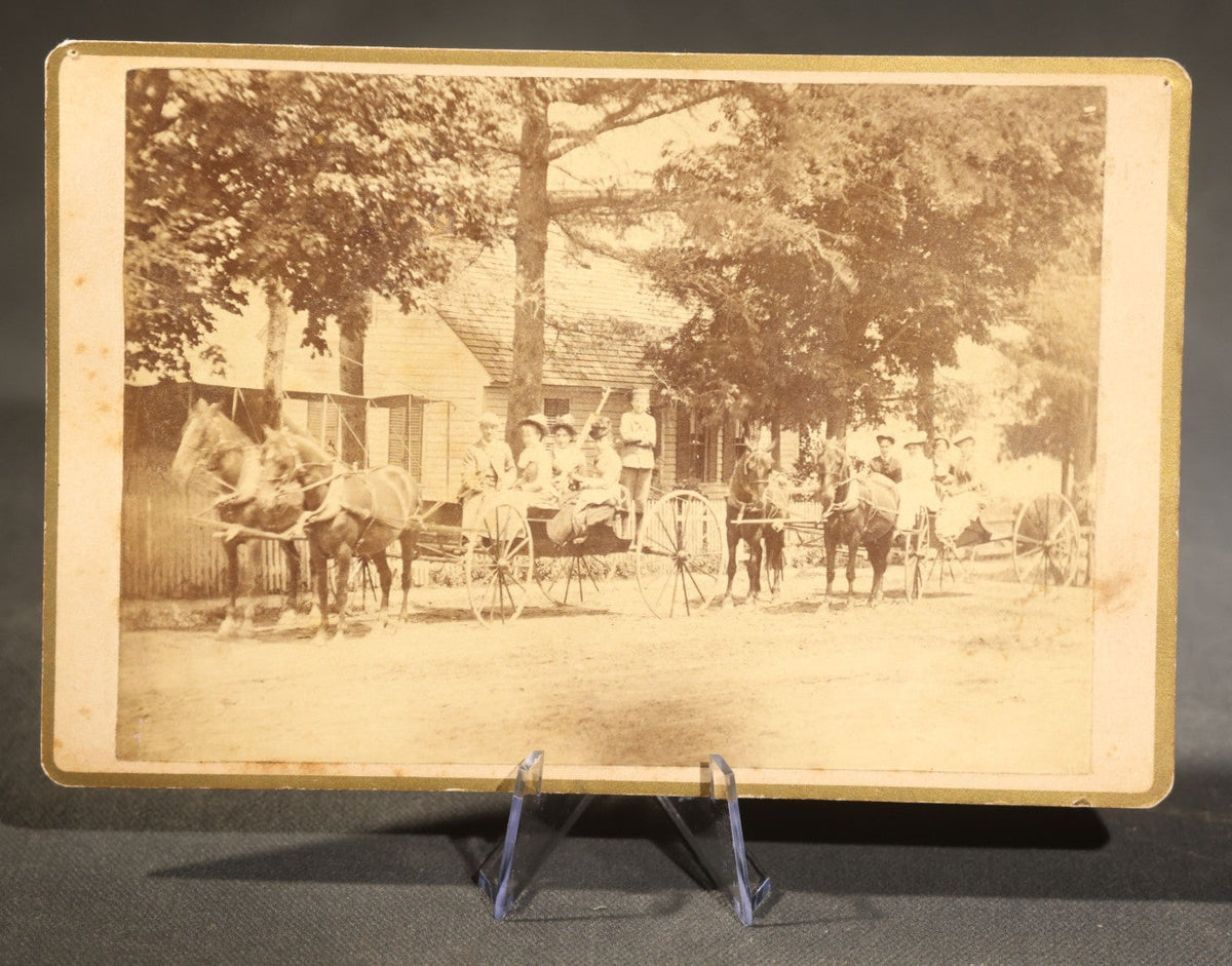 Trio of Antique Board-Mounted Photographs Including a Cabinet Card of a Boy with Violin, by Hardy, Boston, a Horse-Drawn Carriage Party by J. P. Haseltine, Lancaster, New Hampshire, and a Man Posed with Cannons, by Hollis Studio, Boston