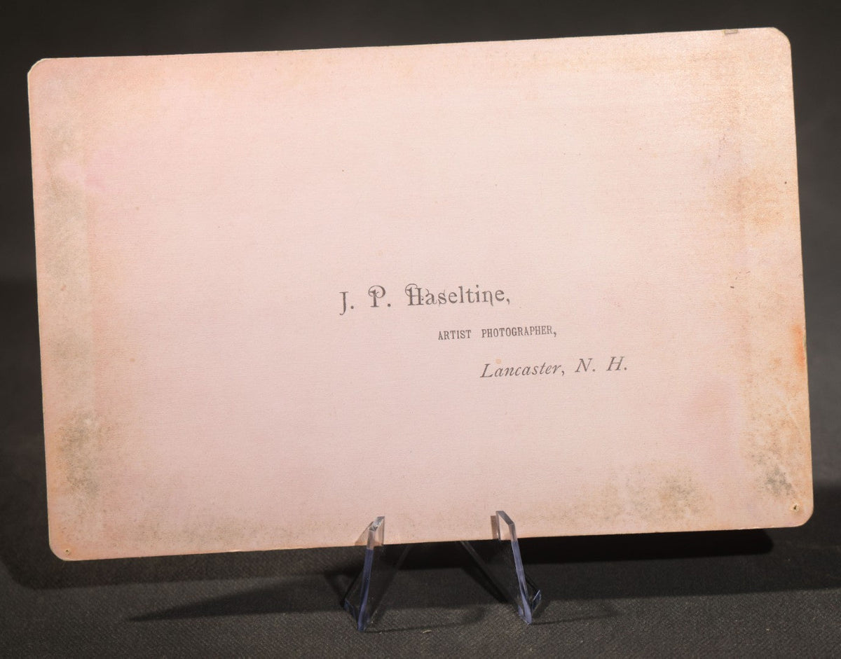 Trio of Antique Board-Mounted Photographs Including a Cabinet Card of a Boy with Violin, by Hardy, Boston, a Horse-Drawn Carriage Party by J. P. Haseltine, Lancaster, New Hampshire, and a Man Posed with Cannons, by Hollis Studio, Boston
