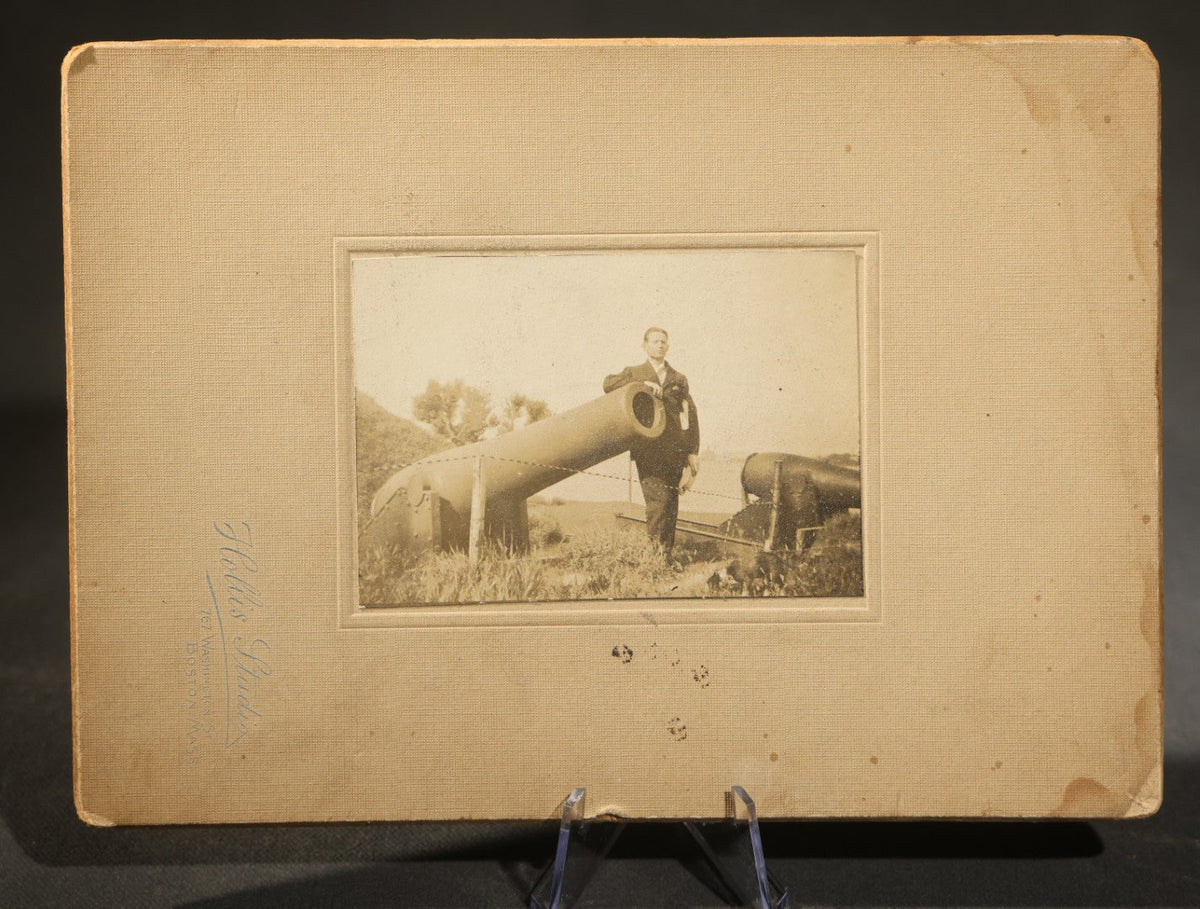 Trio of Antique Board-Mounted Photographs Including a Cabinet Card of a Boy with Violin, by Hardy, Boston, a Horse-Drawn Carriage Party by J. P. Haseltine, Lancaster, New Hampshire, and a Man Posed with Cannons, by Hollis Studio, Boston